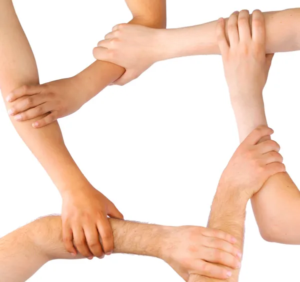 Business linking hands in teamwork — Stock Photo, Image