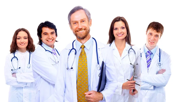 Portret van een groep lachende ziekenhuiscollega 's die samen staan — Stockfoto