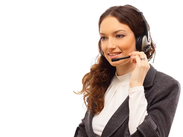 Mulher vestindo fone de ouvido no escritório; poderia ser recepcionista — Fotografia de Stock