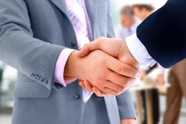 Handshake isolated on business background — Stock Photo, Image