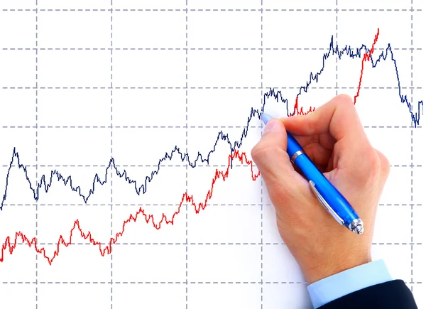 Businessman drawing an organization chart on a white board — Stock Photo, Image