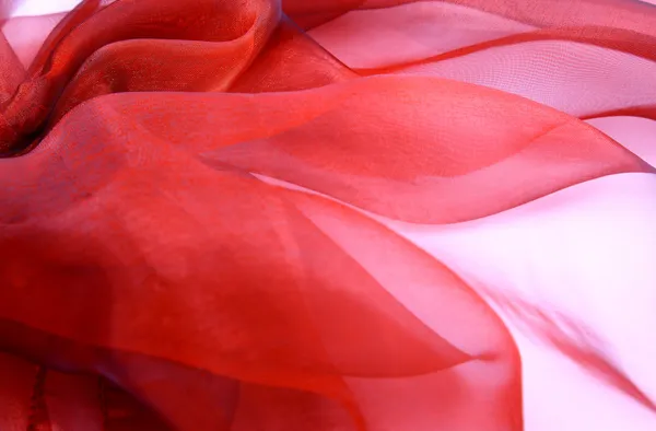 Glatte elegante rote Seide kann als Hintergrund verwendet werden — Stockfoto