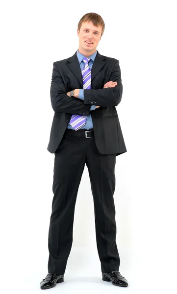 Giovane uomo d'affari in piedi contro isolato sfondo bianco — Foto Stock