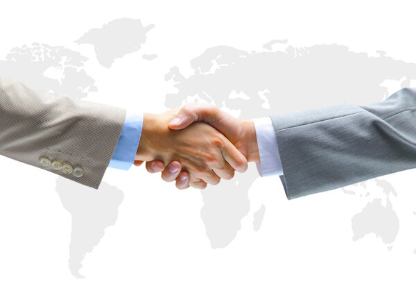 Рукопожатие на фоне карты мира
