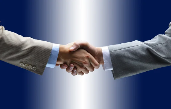 Handshake isolerad på blå bakgrund — Stockfoto