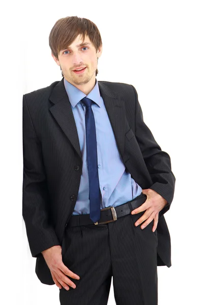 Yakışıklı bir genç adam bir takım elbise içinde portresi. — Stok fotoğraf