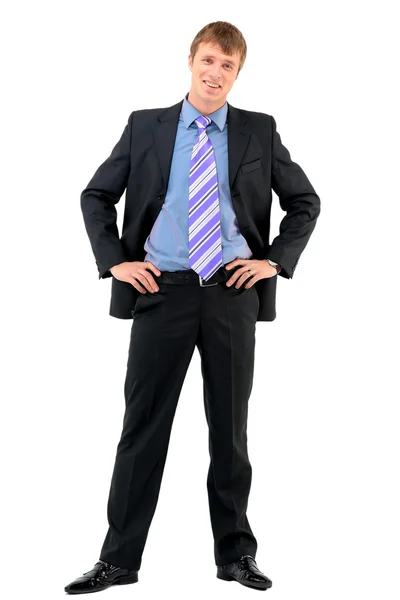 Jovem empresário de pé contra fundo branco isolado — Fotografia de Stock
