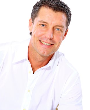 Closeup portrait of a senior man smiling on white background