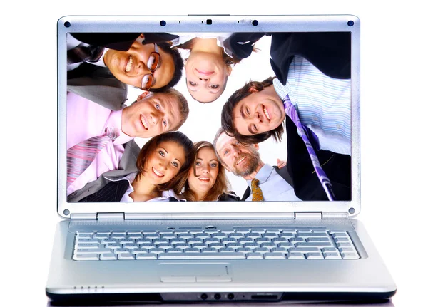 Equipe de negócios em laptops de exibição — Fotografia de Stock