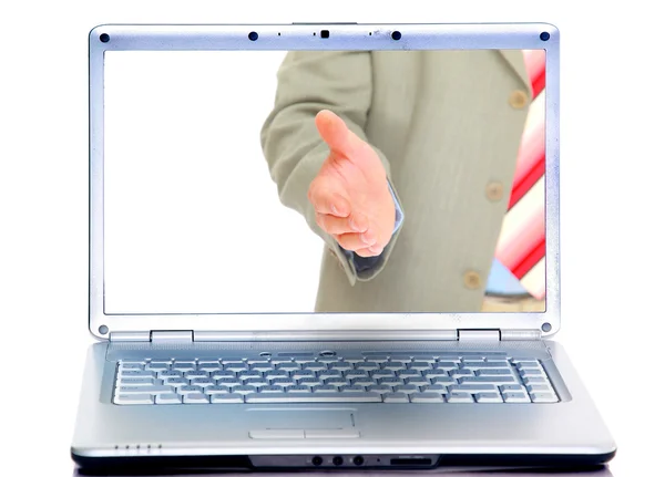 Uścisk dłoni w nowoczesne laptopy wyświetlania — Zdjęcie stockowe