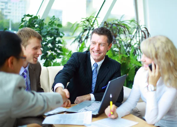 Business shaking hands, finishing up a meeting — Stock Photo, Image