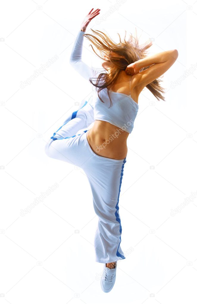 Attractive young woman dancing, hair flying