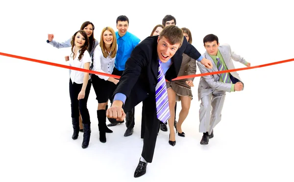 Businesspeople crossing the finish line — Stock Photo, Image