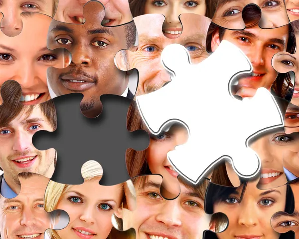 Group of business in pieces of a puzzle — Stock Photo, Image