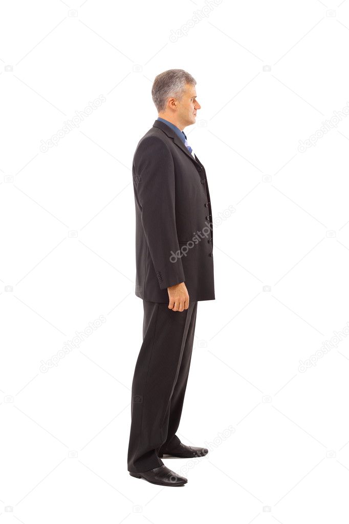 Full length profile of a middle aged business man