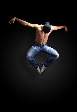 Stylish and young modern style dancer is posing clipart