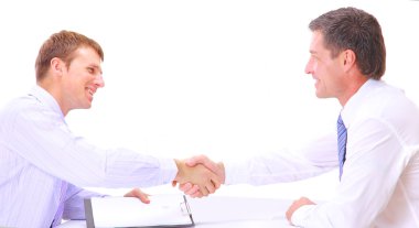 Business shaking hands, finishing up a meeting clipart