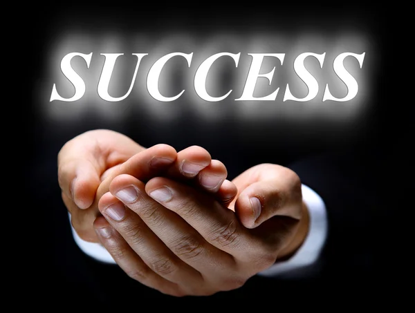Slovo úspěch a ruce — Stock fotografie