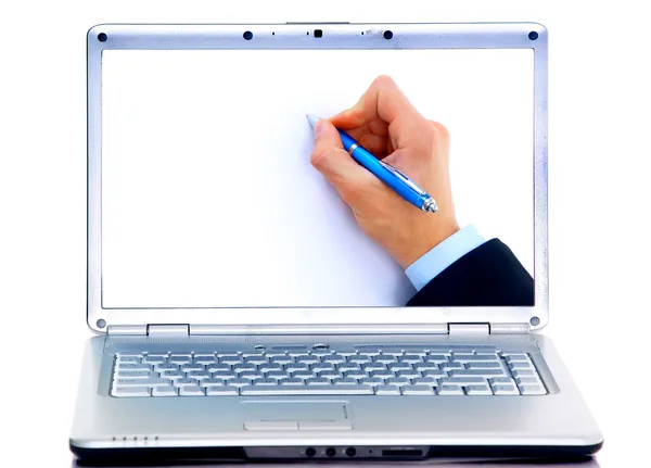 Close up of human hand with pen in display laptops — Stock Photo, Image