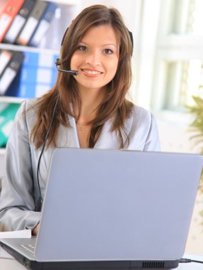 Bright picture of friendly female helpline operator clipart