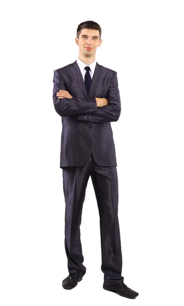 Giovane uomo d'affari in piedi contro isolato sfondo bianco — Foto Stock