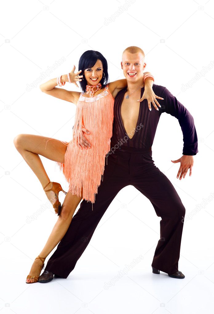 Young couple dancing latino over white