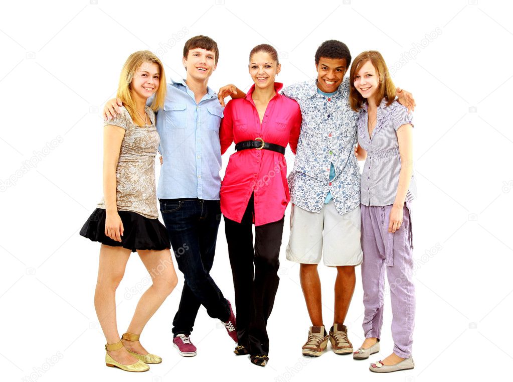 Happy teen young boys and girls standing together against white background