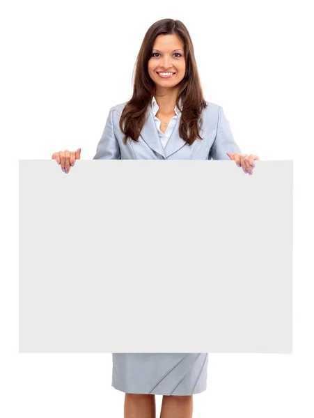 Isolation einer Geschäftsfrau, die neben einem leeren Brett steht — Stockfoto