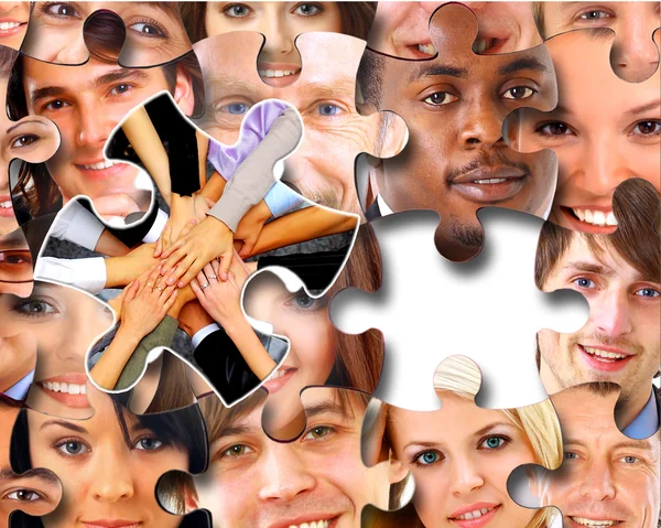 Group of business in pieces of a puzzle — Stock Photo, Image