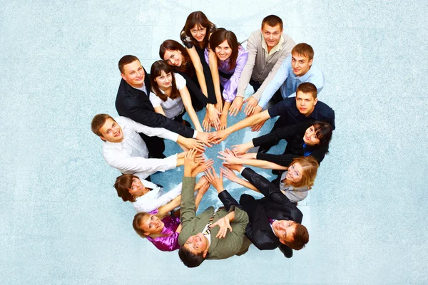 Vista superior de los negocios con las manos juntas en un círculo —  Fotos de Stock