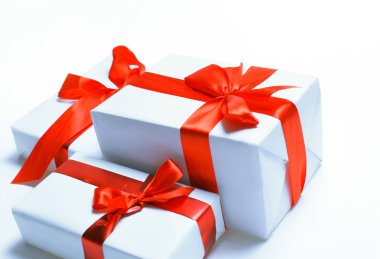 Gift boxes over white background clipart