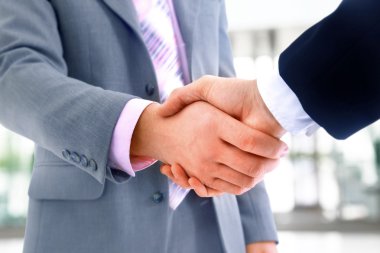 Handshake isolated in office