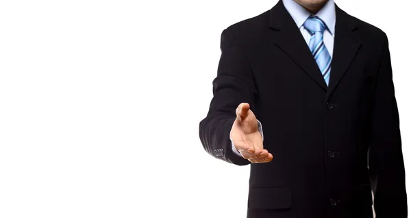Giovane uomo d'affari saluto con stretta di mano isolato su bianco — Foto Stock
