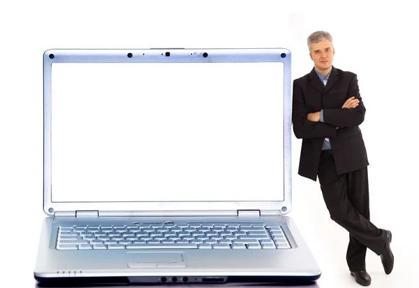 Jeune homme d'affaires et ordinateur portable — Photo