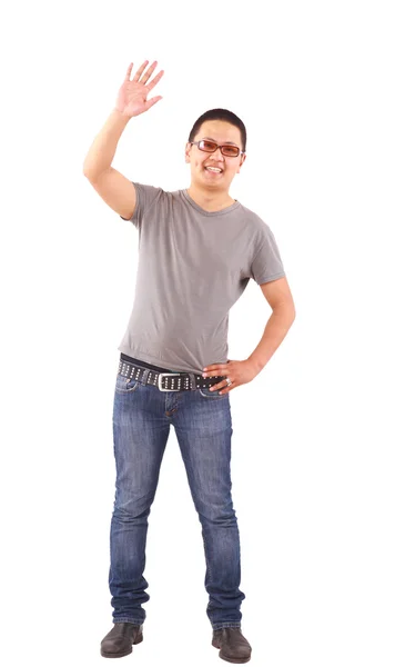 Fiatal férfi, kezével a zsebébe állandó — Stock Fotó