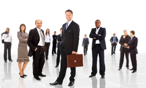 商务男人和他的团队被隔绝在一个白色的背景 免版税图库照片
