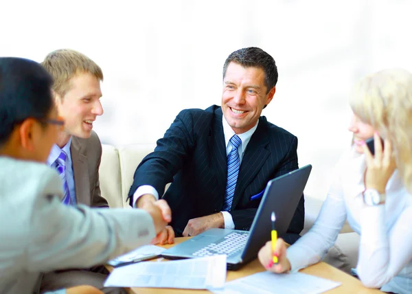 Business shaking hands, finishing up a meeting — Stock Photo, Image