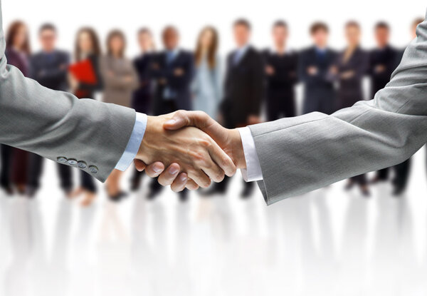 Handshake isolated on business background