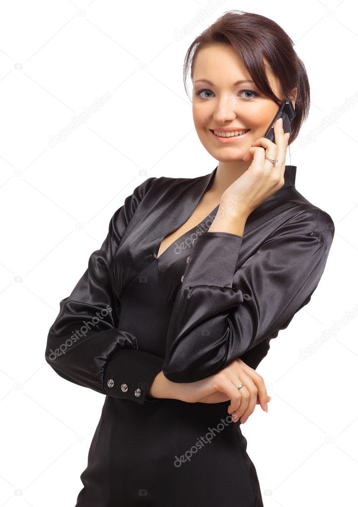 Portrait of a beautiful young woman with cellphone against white background