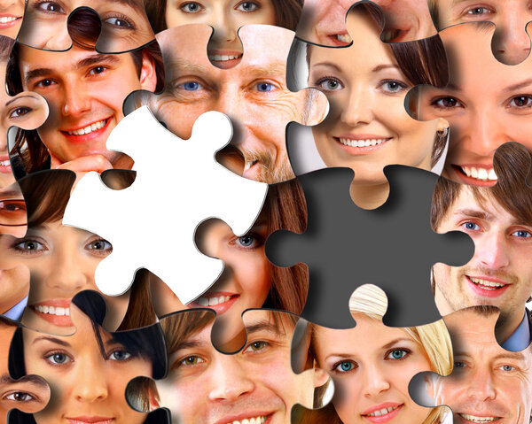 Group of business in pieces of a puzzle
