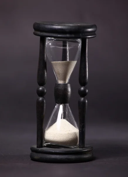 stock image Sand-glass with flowing sand took close