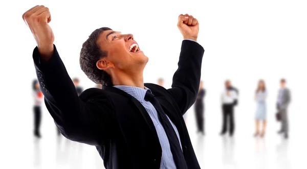 One very happy energetic businessman with his arms raised Stock Picture