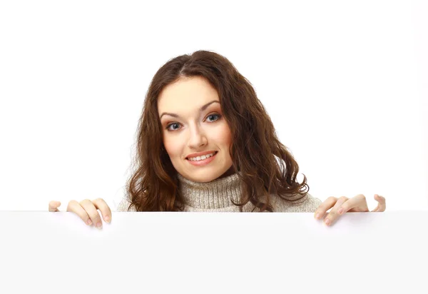 Closeup portret van een jonge zakenvrouw met billboard geïsoleerd op wit — Stockfoto