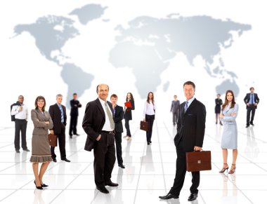 Businessmen standing in front of an earth map clipart