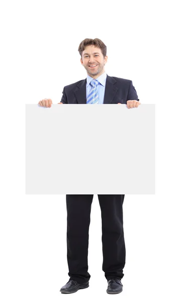 Empresario sosteniendo un anuncio de pancarta aislado en blanco — Foto de Stock