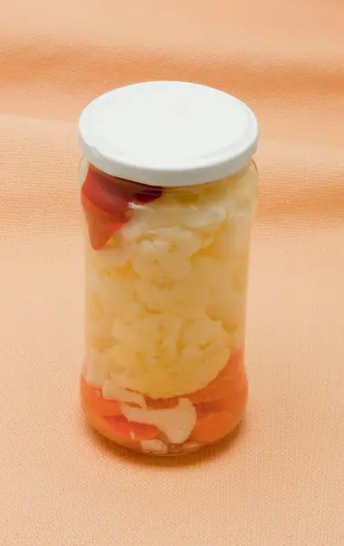 Glas jars with marinated vegetables isolated on — Stock Photo, Image