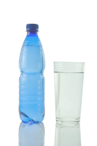 Bottle and glass of mineral water — Stock Photo, Image