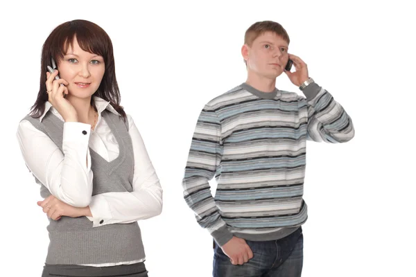 stock image Couple of businesspeople talk cell phone