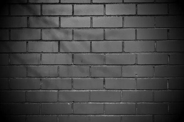 Donkere bakstenen muur — Stockfoto