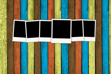 Blank Photos on Wooden Wall clipart